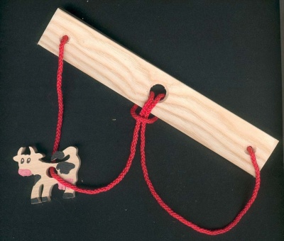 Puzzelbreker La vache, hout en touw handgemaakt
