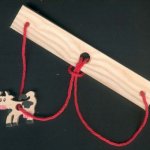 Puzzelbreker La vache, hout en touw handgemaakt